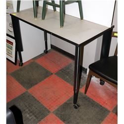 ADJUSTABLE HEIGHT TABLE ON WHEELS. FURNITURE