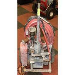 KRAFT TEXTURE MACHINE WITH HOPPER AND HOSES.