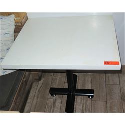 White Table w/ Metal Base (24x30) -  surface of table has damage)