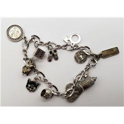 STERLING CHARM BRACELET WITH (11)925 CHARMS