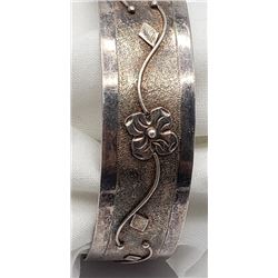 ANTIQUE STERLING CUFF WITH FLORAL DESIGN