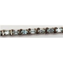 7 INCH STERLING BRACELET WITH LIGHT BLUE STONE