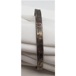 ANTIQUE STERLING BANGLE WITH CIRCULAR