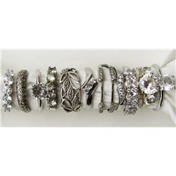 11-STERLING RINGS WITH FLASHY CLEAR STONE