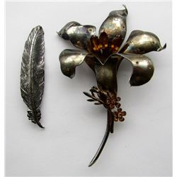 2-ANTIQUE BROACHES. (1) FEATHER & (1) FLOWER W/