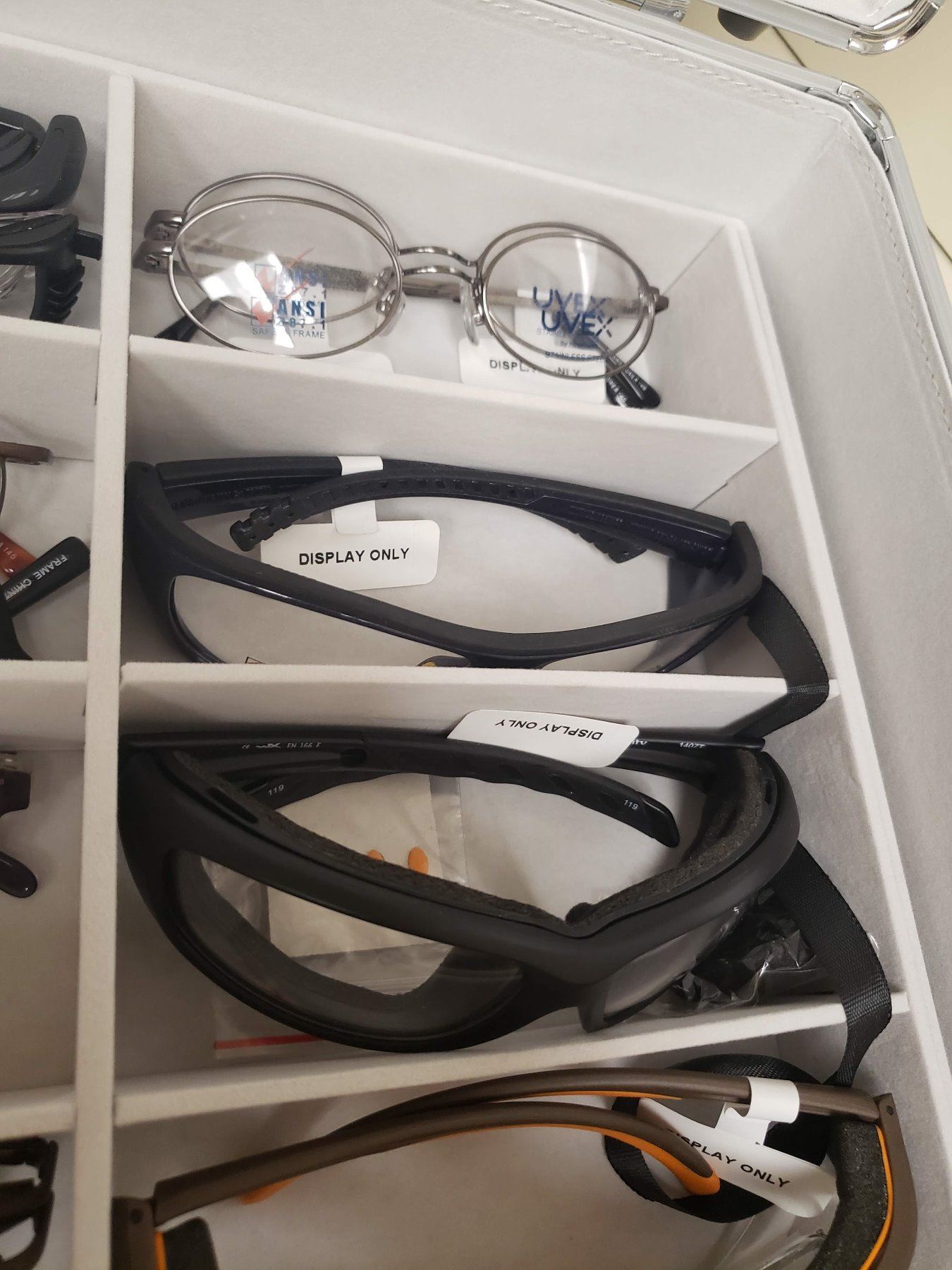 32 PAIRS OF SAMPLE GLASSES BY PROTEC EYEWEAR WITH CASE