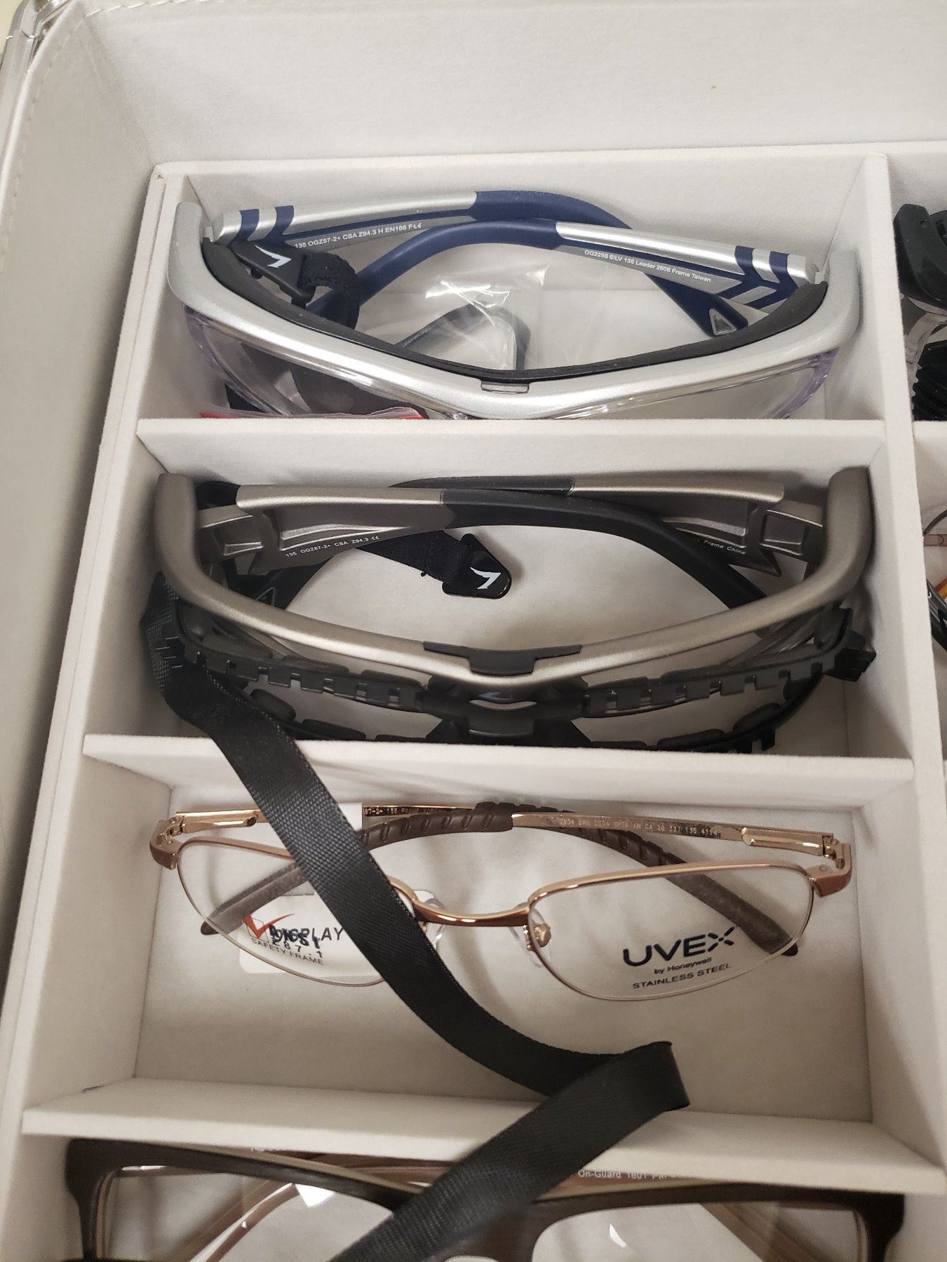32 PAIRS OF SAMPLE GLASSES BY PROTEC EYEWEAR WITH CASE