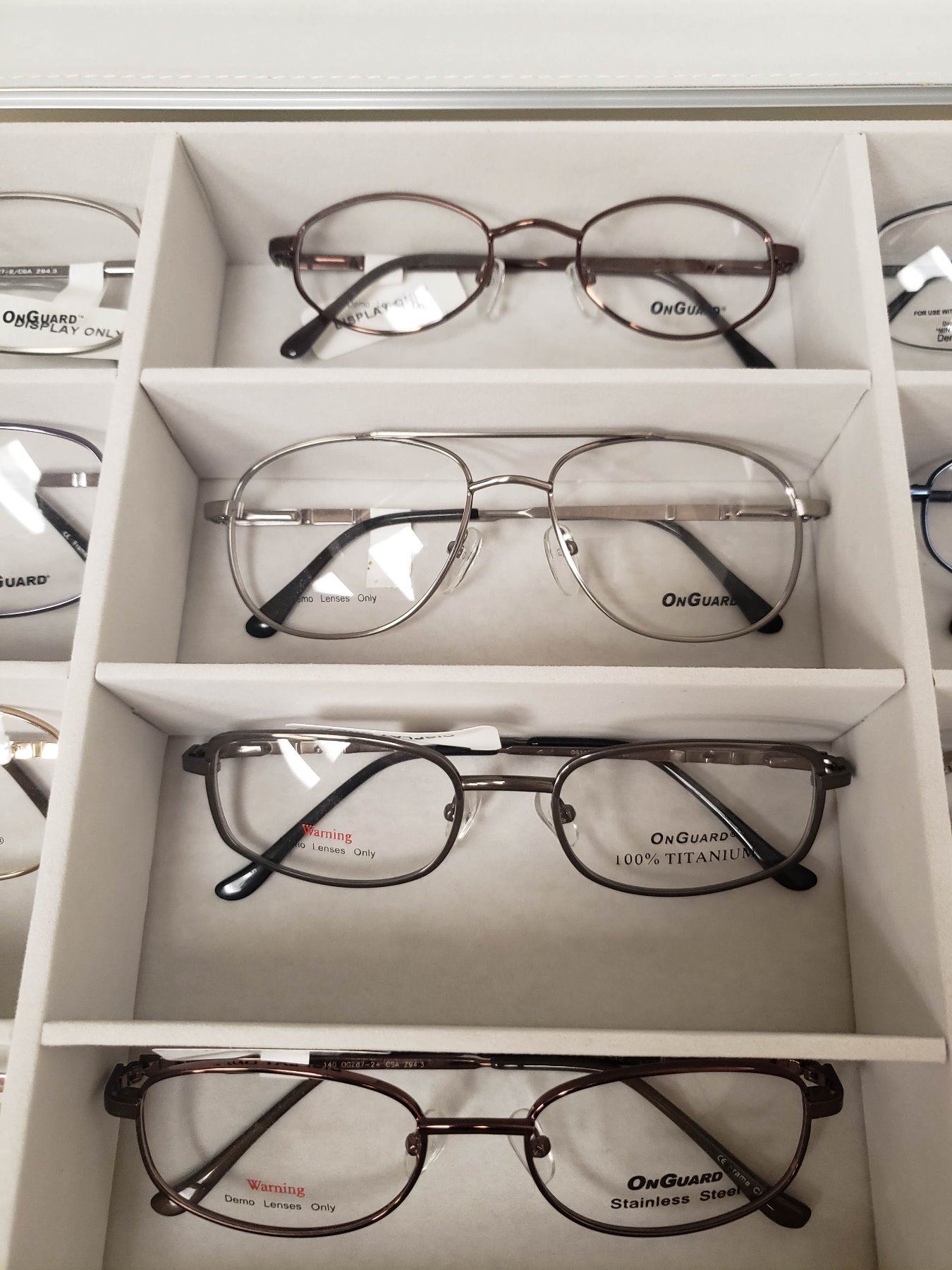 32 PAIRS OF SAMPLE GLASSES BY PROTEC EYEWEAR WITH CASE