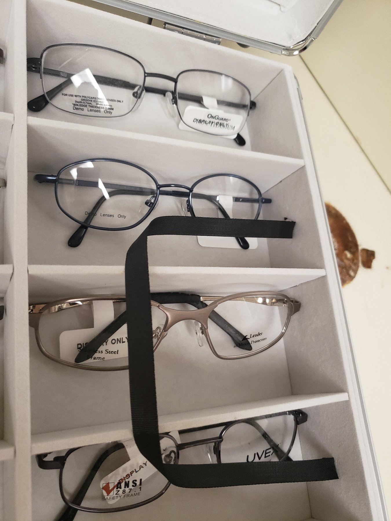 32 PAIRS OF SAMPLE GLASSES BY PROTEC EYEWEAR WITH CASE