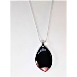 18)  TEAR DROP SHAPED BLACK WITH