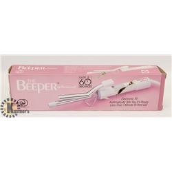 THE BEEPER CURLING IRON.