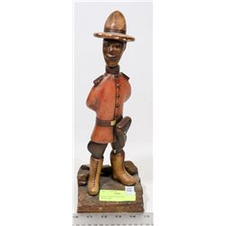 WOOD CARVED MOUNTIE SCULPTURE.