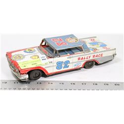 1950S TIN JAPAN RACE CAR WITH GARAGE.