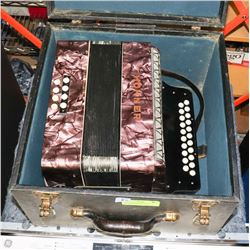 VINTAGE HOHNER BUTTON ACCORDIAN WITH CASE.