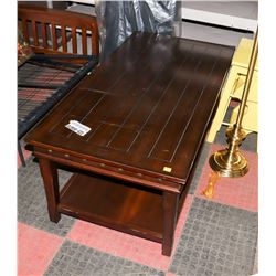 WOOD TONE COFFEE TABLE-MINOR DAMAGE.