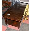 Image 1 : WOOD TONE COFFEE TABLE-MINOR DAMAGE.