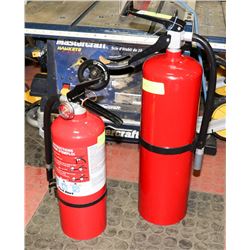 TWO FIRE EXTINGUISHERS .
