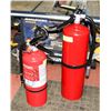 Image 1 : TWO FIRE EXTINGUISHERS .