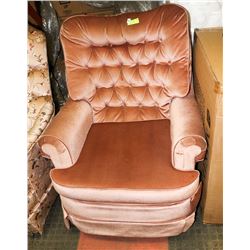 UPHOLSTERED PINK/ROSE SWIVEL ROCKER CHAIR.