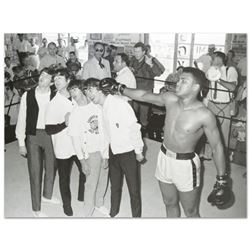 "Muhammad Ali Punching The Beatles" Licensed Photograph of Heavyweight Champ Muhammad Ali and the Be