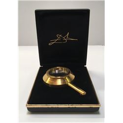 SALVADOR DALI GOLD LENS IN JEWELRY BOX USED FOR LINCOLN DALIVISION