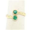 Image 1 : 14k Yellow Gold Round Bezel Set Emerald Two Stone Simple Bypass Ring