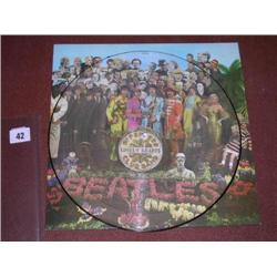 The Beatles Sgt Peppers 12 inch picture disc Record PHO 7027 stereo Excellent + condition .