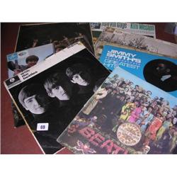 Approx 50 LP and single Records to include The Rolling Stones, Animals, Beatles ect