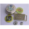 The Beatles: 3 pin badges, a John Lennon brass belt buckle and an unusual powder compact with a Paul