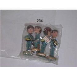 The Beatles 4 Beatles 'noddlers' nodding figures, in original packaging