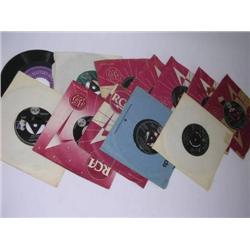 Elvis Presley: a collection of twelve Single Records tri-centres HMV labels, to include All Shook Up