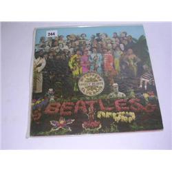 The Beatles "Sgt. Peppers" LP Record PCS 7027 stereo 1st pressing with original red and white inner 
