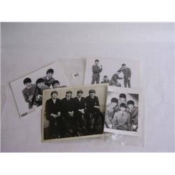 The Beatles two original 1963 Nempix black and white publicity photographs, one full pose and one ra