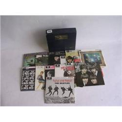 The Beatles EP collection fourteen EP Records in blue box with gold lettering released by Parlophone