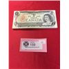 Image 1 : 50 $1 1973 Bank Of Canada Banknotes in Sequence in Protective Holder