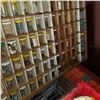 Image 11 : WOOD HARDWARE ORGANIZER FULL OF JARS OF HARDWARE AND RED TOTE OF HARDWARE