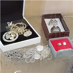 LOT OF WOMENS DINNER RINGS, NECKLACES, AND EARRINGS