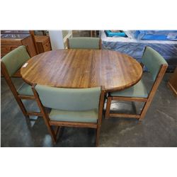 ROUND OAK DINING TABLE W/ LEAF AND 4 CHAIRS