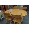Image 1 : ROUND OAK DINING TABLE W/ LEAF AND 4 HOOP BACK CHAIRS