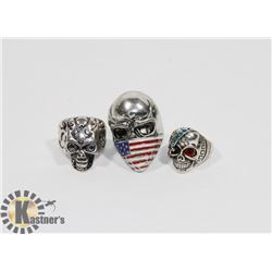 THREE SKULL SHAPED RINGS