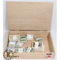 CIGAR BOX WITH 10X100 BUNDLED & CATALOGUED STAMPS.