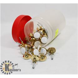 BIN OF BRASS CUPBOARD KNOBS.