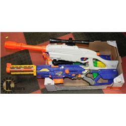 BOX W/ VARIOUS NERF GUNS AND EXTRA MAGS.
