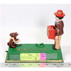 VINTAGE CAST IRON MECHANICAL MONKEY COIN BANK.