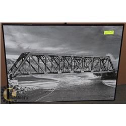 PICTURE OF BOW RIVER BRIDGE, FRAMED.