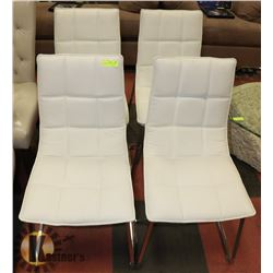 LOT OF 4 WHITE PADDED DINING CHAIRS.