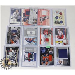 BIN OF 13 HOCKEY JERSEY/PATCH CARDS