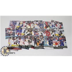 BIN OF 59 YOUNG GUNS HOCKEY CARDS