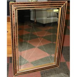LARGE FRAMED WALL MIRROR.