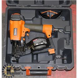 NAIL GUN IN RIDGID CASE.